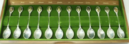 A cased set of twelve modern silver teaspoons for The Royal Horticultural Society,