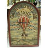 A painted wooden sign depicting an air balloon in relief inscribed "Geo Blunts Balloon Flight
