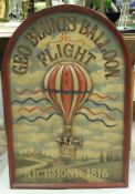 A painted wooden sign depicting an air balloon in relief inscribed "Geo Blunts Balloon Flight