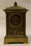 A late Victorian brass cased mantel clock the eight day movement by Japy Freres of Paris the