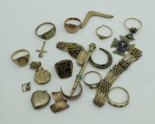 A collection of various 9 carat gold jewellery and parts to include cut rings, chains,