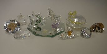 A collection of Swarovski Crystal Society ornaments to include event gifts etc including heart