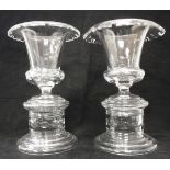 A pair of William Yeoward glass campana shaped urn vases with folded rims