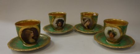 A set of four Vienna porcelain cabinet cups (36454) each decorated with a hand painted portrait of