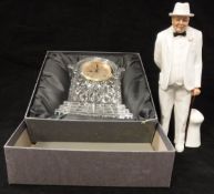 A Waterford Crystal cased mantel clock and a Royal Doulton figure "Sir Winston Churchill" modelled