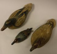 Four various modern painted decoy ducks