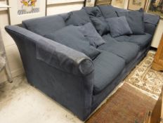 A pair of modern blue upholstered triple sofas