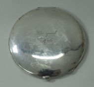 An early to mid 20th Century Dutch silver compact stamped "800" and engraved "Be good Hub" to front