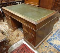 A Victorian oak double-pedestal desk