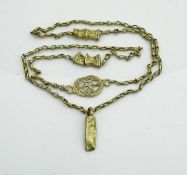 A Roman high carat gold Chieftan style necklace with hanging pendant and filigree-style decorative