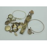 A collection of gold jewellery to include a 9 carat gold charm bracelet with various 9 carat gold