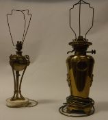 A Regency style gilt brass and alabaster mounted table lamp with satyric mask decoration,