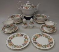 A Paragon china "Country Lane" dinner/tea service comprising oval meat plate, eight dinner plates,