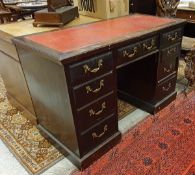 A late Victorian mahogany double-pedestal desk