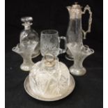 A collection of glassware to include cut glass claret jug decorated with a heron with gothic
