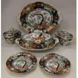 A 19th Century Mason's ironstone china Imari blossoming tree pattern dinner service comprising