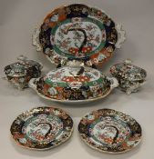 A 19th Century Mason's ironstone china Imari blossoming tree pattern dinner service comprising