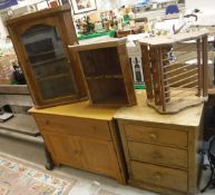 A modern American pine cabinet with drawer over two doors, a Victorian pine chest of three drawers,