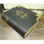 A leather and brass bound Holy Bible edited by Reverend John Eadie