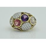 An 18 carat gold diamond and purple and pink hued gem set ring, stamped 'FABERGE' and No'd.