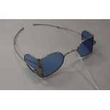 A pair of early Victorian silver mounted blue glass sunglasses with folding frames (London 1838)