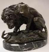 AFTER ANTOINE-LOUIS BARYE "Lion and snake" a chocolate patinated bronze study on a variegated grey