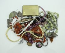A collection of assorted beaded necklaces to include an early 20th Century graduated ivory bead