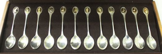 A cased set of twelve silver teaspoons for The Royal Society of Protection of Birds",