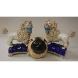 A pair of circa 1900 Sampson of Paris poodle figurines with gold anchor mark to base together with