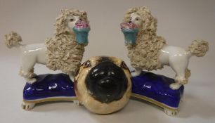 A pair of circa 1900 Sampson of Paris poodle figurines with gold anchor mark to base together with