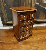 A 19th Century mahogany miniature chest of two short over three long drawers