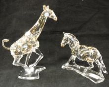 A Swarovski Crystal Society coloured crystal model zebra with box and similar giraffe with box