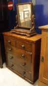 A Victorian walnut chest of drawers and a figured mahogany dressing mirror