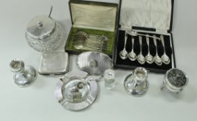 A collection of silver wares to include a cased set of six silver teaspoons, a silver ashtray,