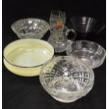 A collection of various glassware to include vaseline glass fruit bowl, amethyst glass fruit bowl,