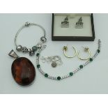 A collection of modern costume jewellery to include a Pandora bracelet with various charms,