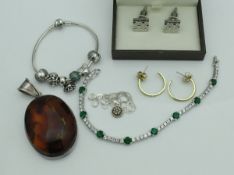 A collection of modern costume jewellery to include a Pandora bracelet with various charms,