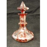 A 19th Century bohemian ruby overlaid and cut glass dressing table scent bottle of faceted baluster