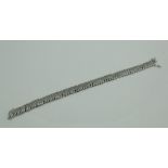 A 9 carat white gold and diamond bracelet, approx 29 cm long, approx 16.