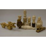A collection of various carved bone and other bottle stoppers, carved gilt Chinese dragon ornament,