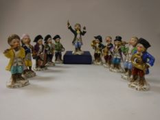 A 20th Century Sitzendorf eleven piece monkey band including conductor