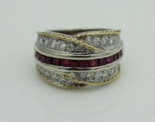 A yellow and white gold (unmarked) dress ring,