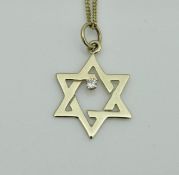 A 14ct gold necklace with Star of David pendant set with a solitaire diamond
