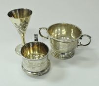A George V silver twin-handled trophy cup of plain form, raised on stepped circular base,