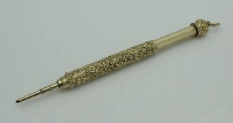 A yellow metal propelling pencil by WS Hicks of New York,