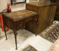 A pine two-door cupboard and walnut writing table