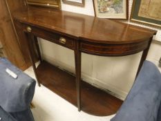 A mahogany and inlaid single drawer serving table in the George III style on square tapered legs