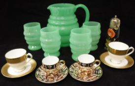 A 1930's jade green glass lemonade set of jug and four tumblers, a Birks Rawlins & Co.