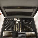 A leather-cased Solingen canteen of cutlery,