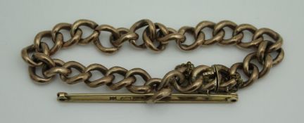A 9 carat gold hollow chain link bracelet and a 9 carat gold bar pin of plain form,